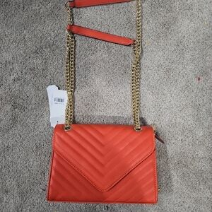 Elegant Orange Crossbody Bag with Gold Chain